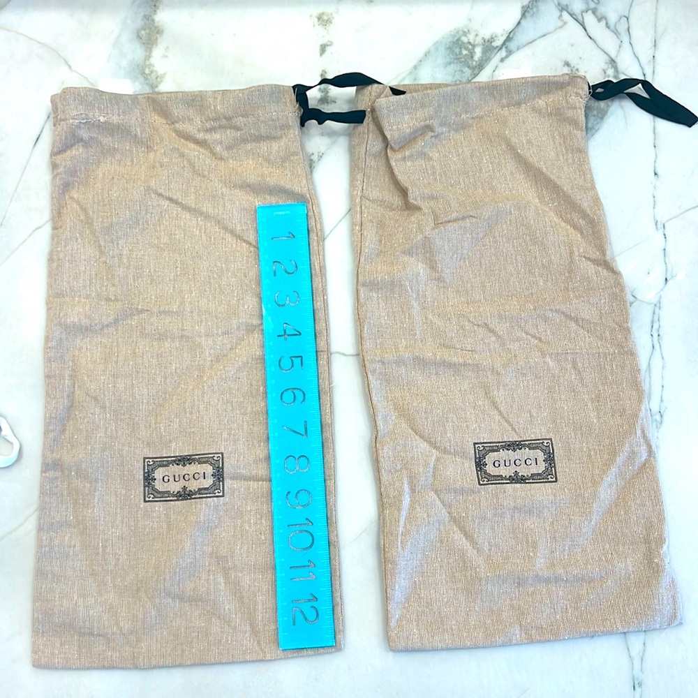 Two Gucci storage bags. New